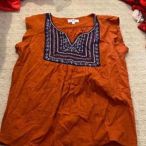Large orange blouse